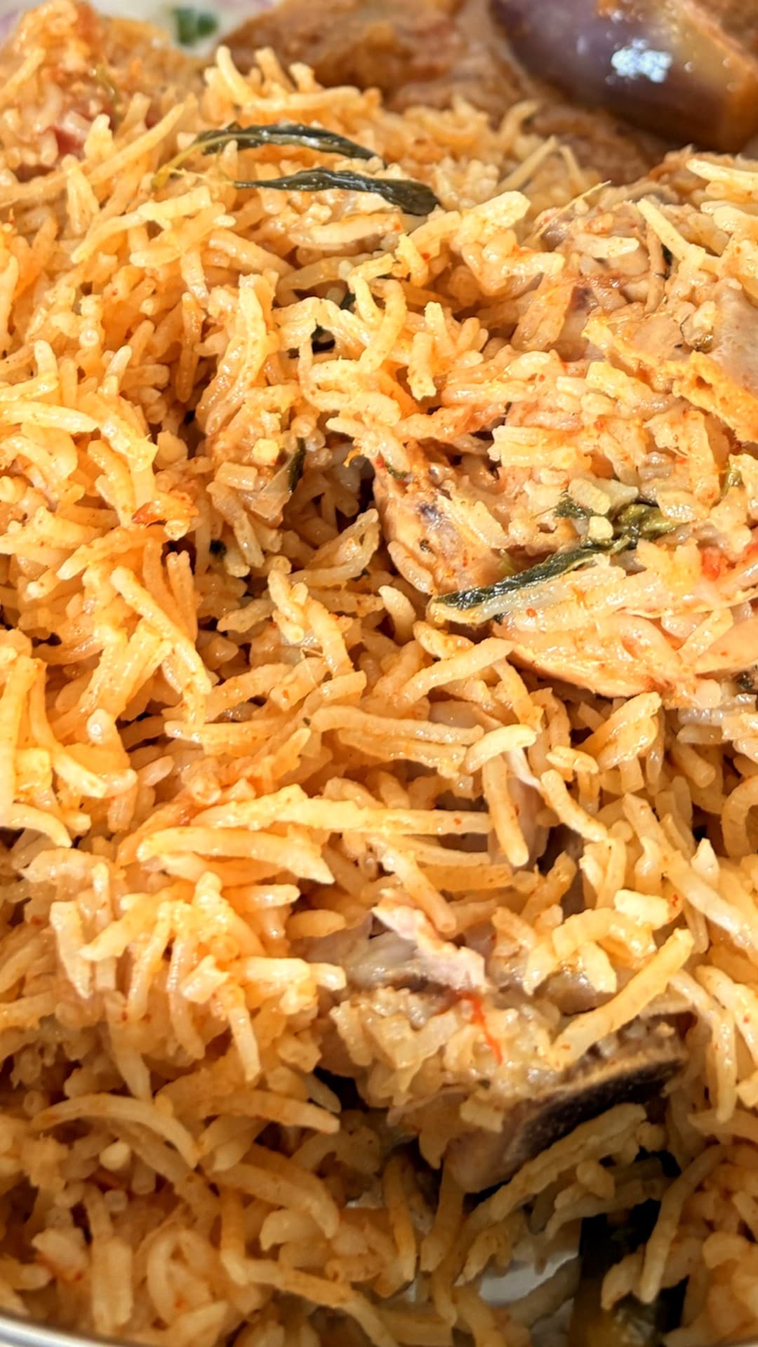 Chicken biryani with onion raita